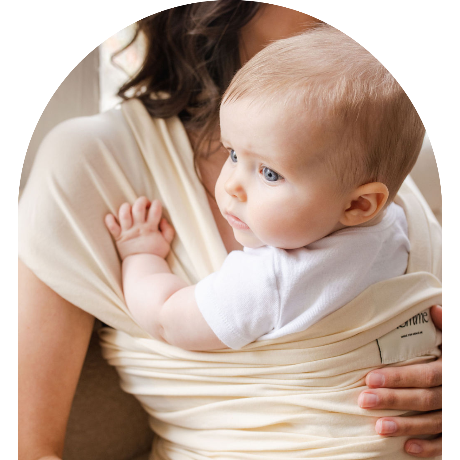 Mom and baby in newborn kangaroo wrap by Momme