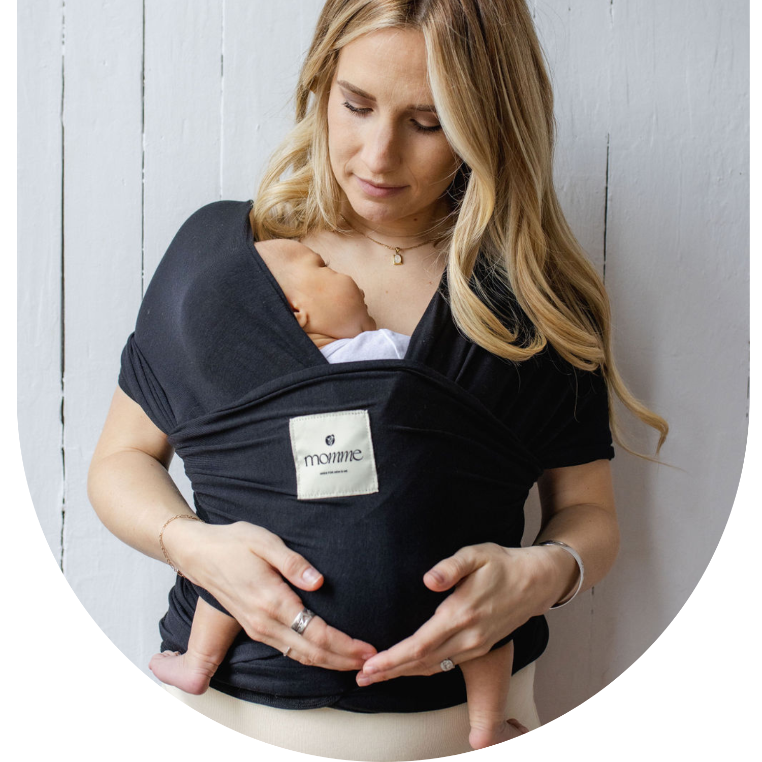 Momme | Newborn baby in midnight kangaroo wrap