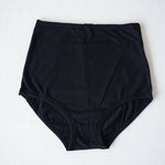 Black high-waisted pregnancy and postpartum briefs in deep navy by Momme